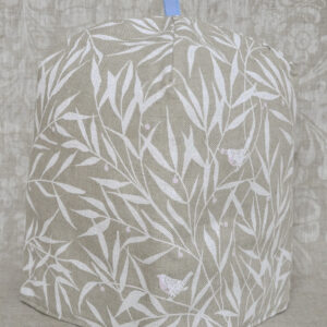 Okste ja linnuga tassisoojendaja